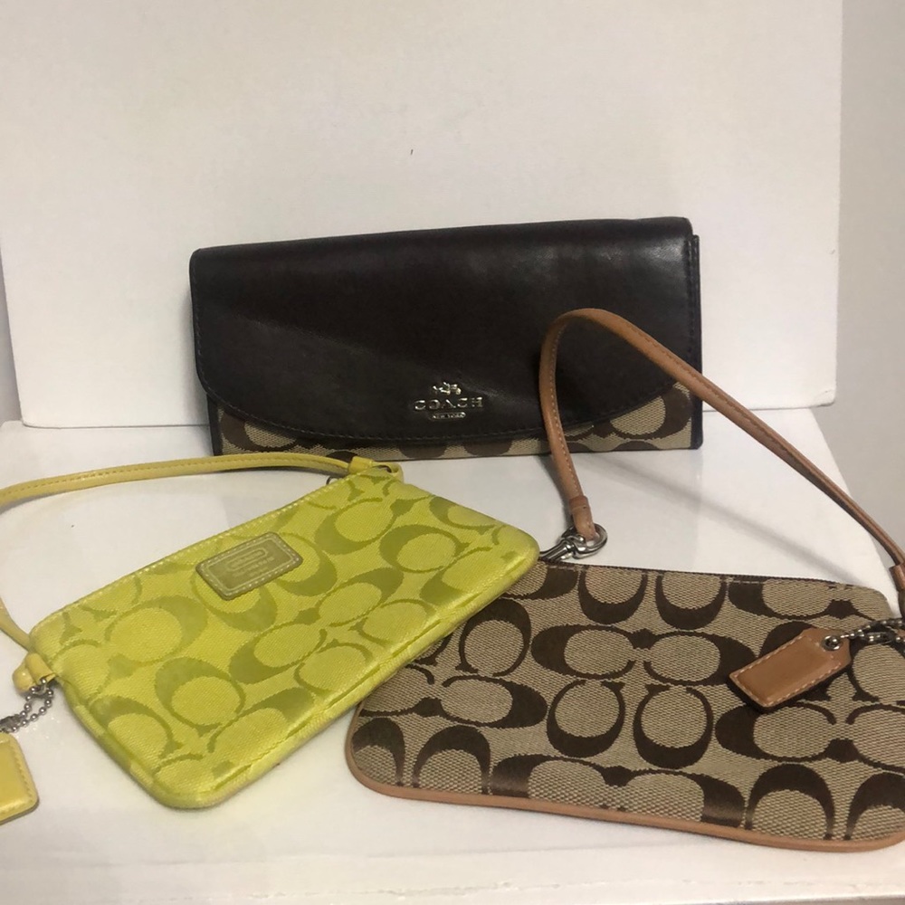 Coach hand held 3 for the price of one new never used no tags